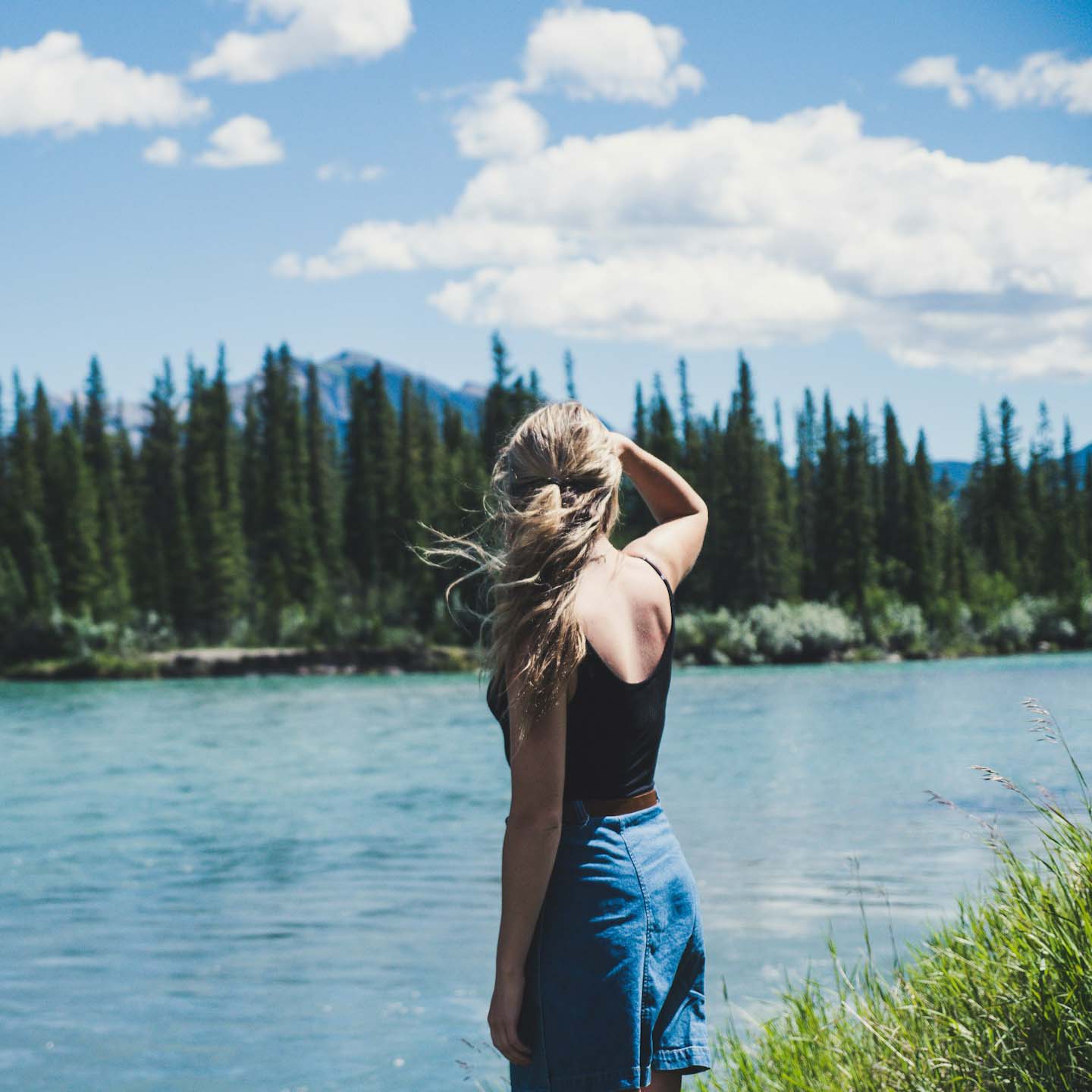 navigating change - woman looking out at trees